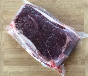 Vacuum-sealed beef roast from Clover Leaf Farm Meats, dry aged and USDA inspected